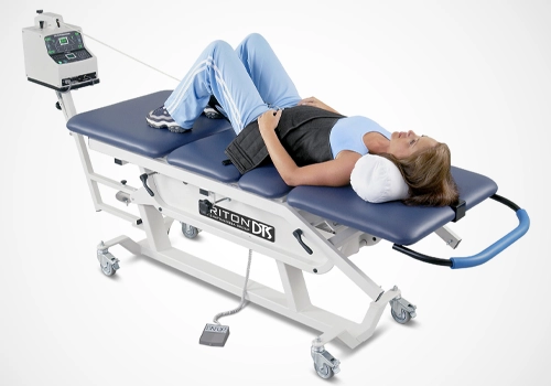 Chiropractic Silver Spring MD Woman In Traction Machine